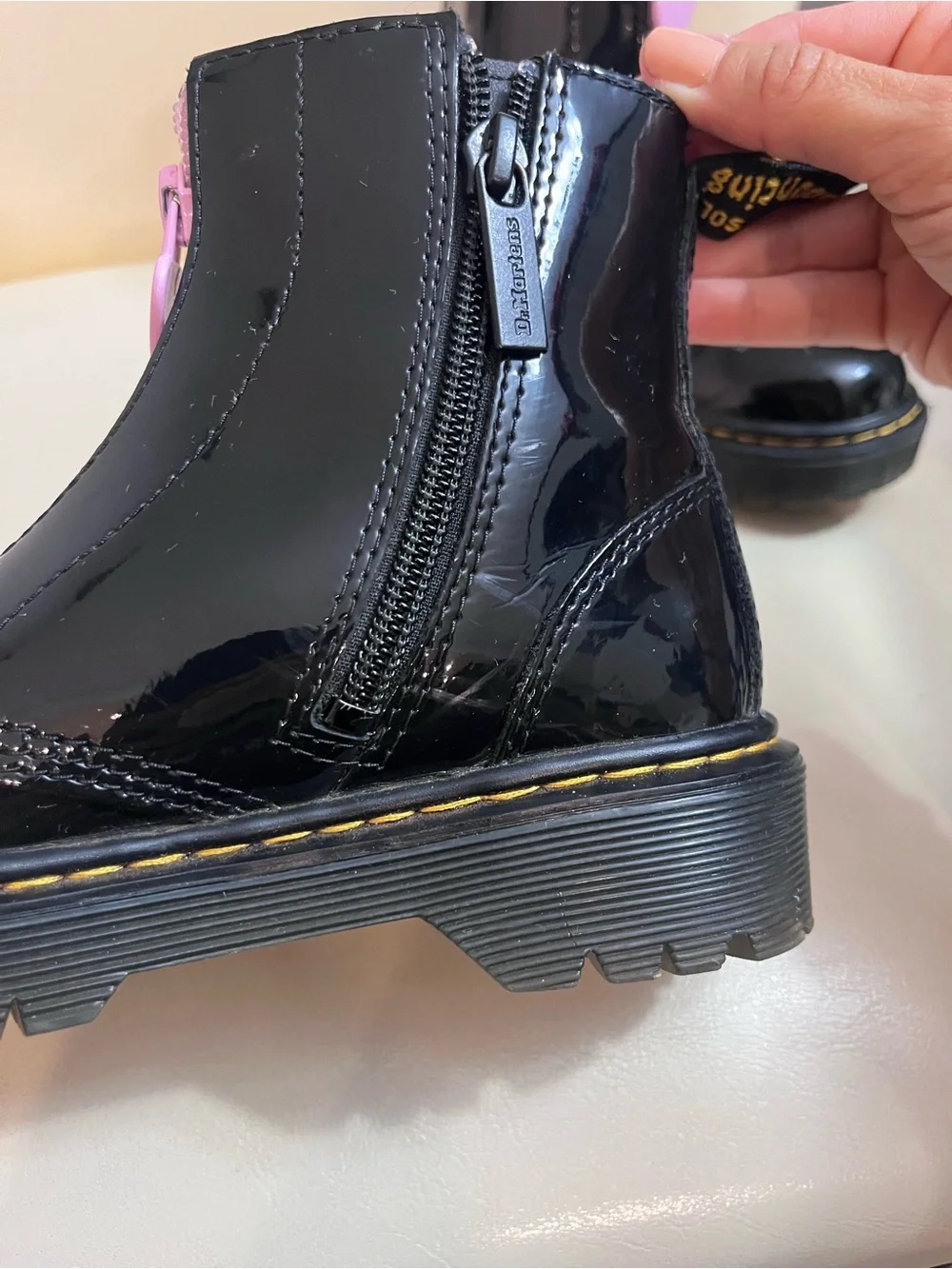 Kids Dr. Martens Black Patent Heart Accent Boots with Pink Lining